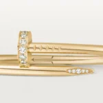 Cartier / JUSTE UN CLOU BRACELET Juste un Clou bracelet, classic, 18K yellow gold (750/1000), set with 32 brilliant-cut diamonds totaling 0.58 carat. Width: 3.5 mm (for size 17). - Image 7